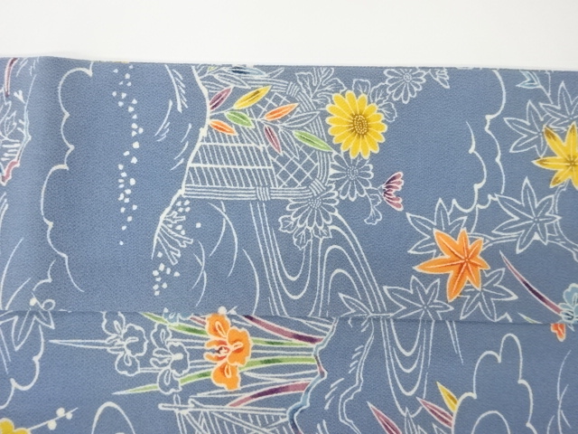  縮緬地柴垣に流水・草花模様名古屋帯